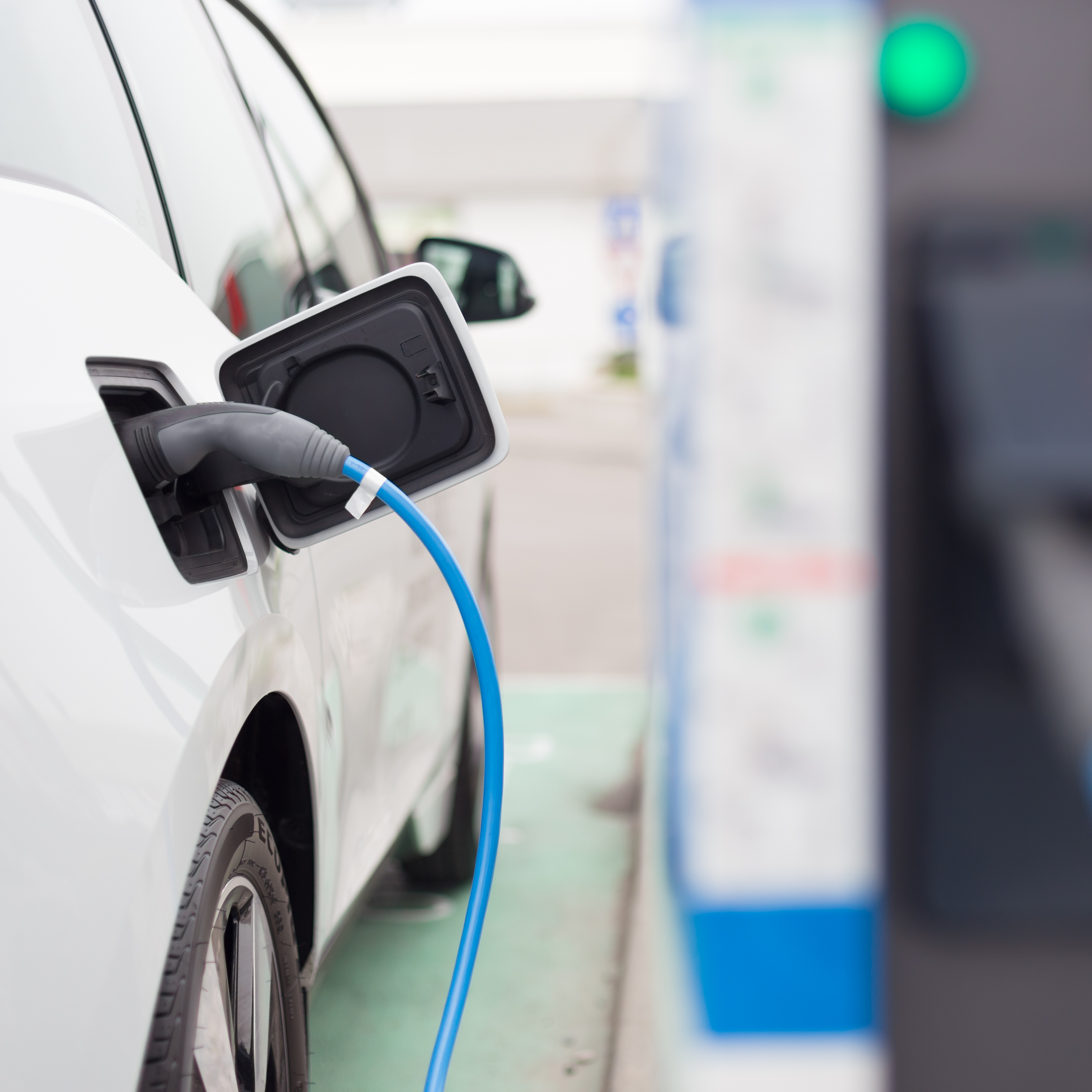 Electric Car in Charging Station.