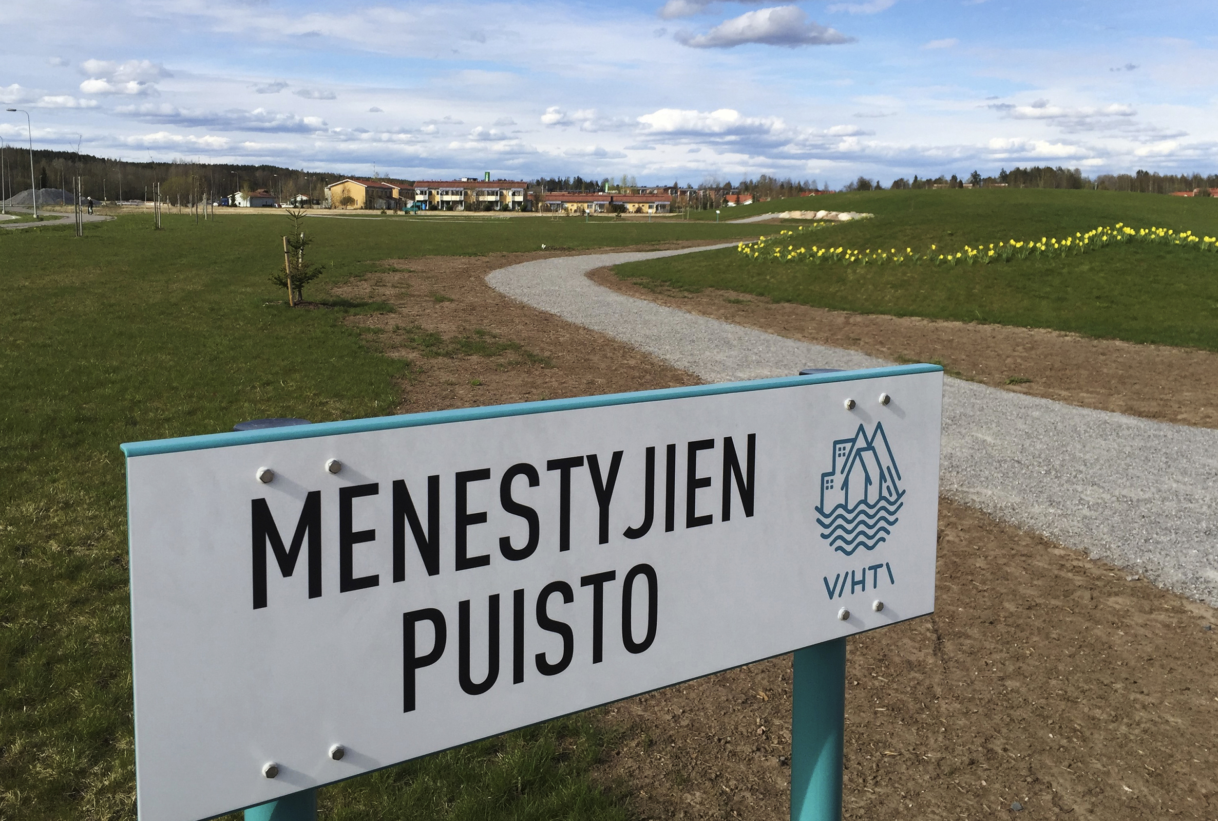 Menestyjien puiston kyltti