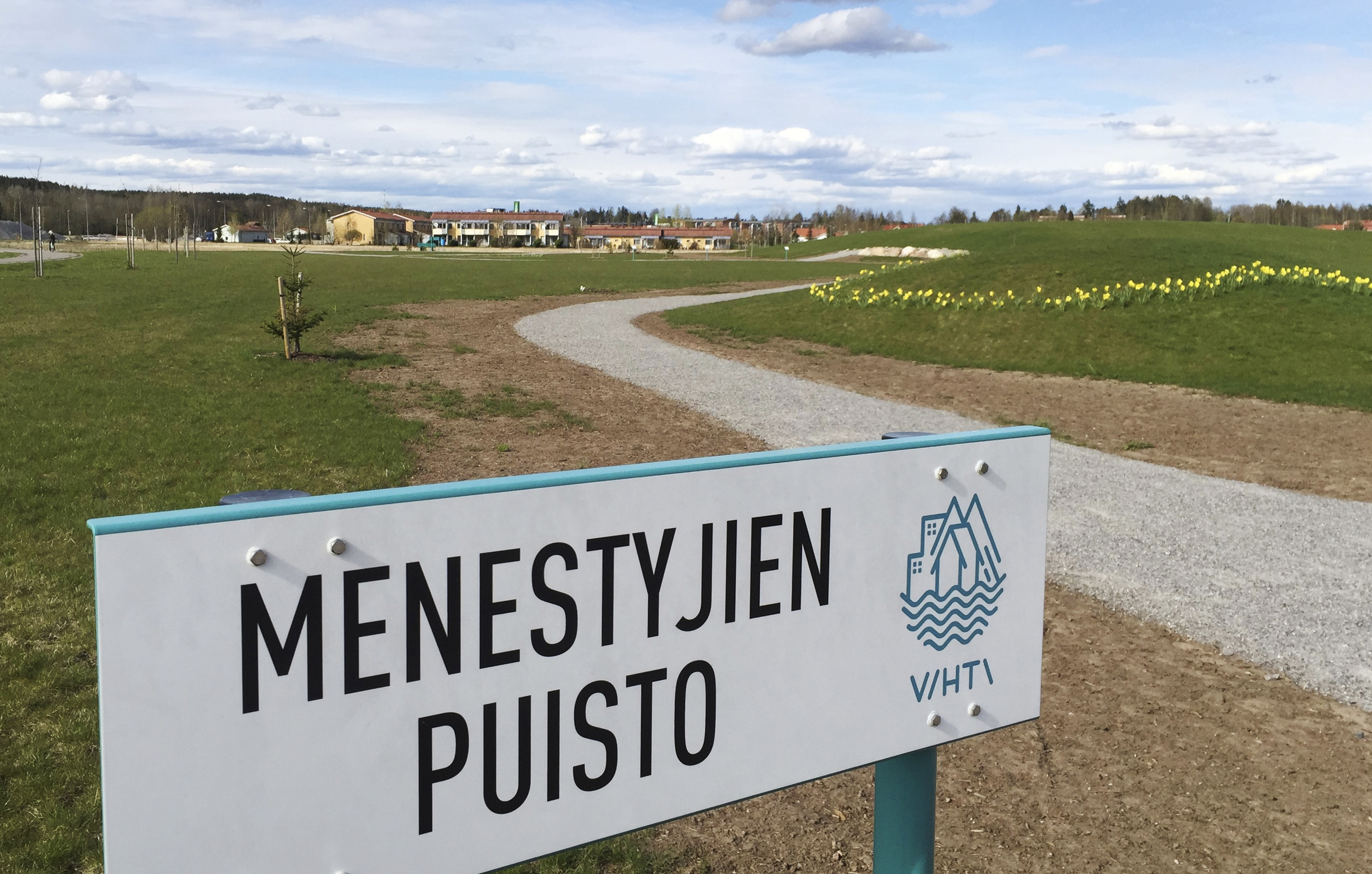 Menestyjien puiston kyltti