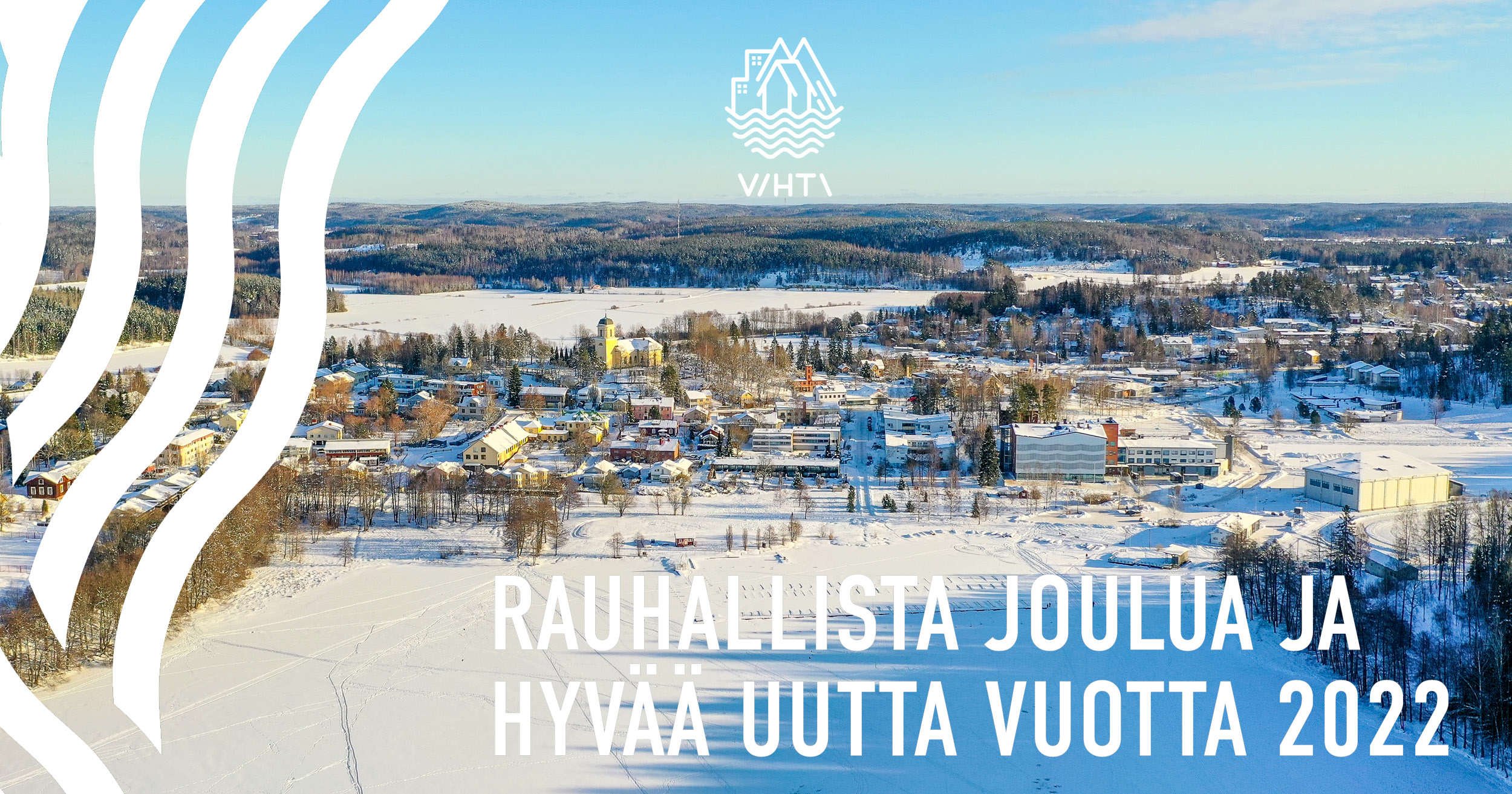 Talvinen Vihdi kirkonkylä, kuva sisältää joulutervehdyksen